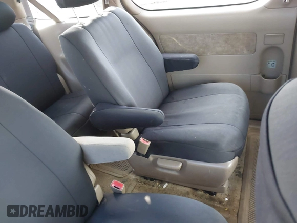 2002 Toyota Sienna LE with VIN 4T3ZF13C82U457803, listed as a IAAI auction lot 41198246 with 185,445 mi miles and . Bid and sale history available at DreamBid. Image 8.