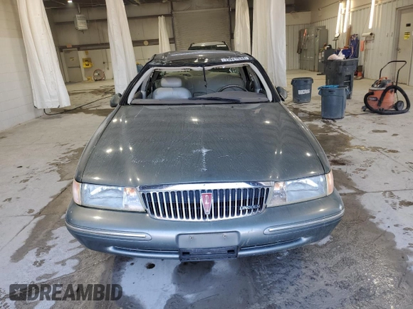 1997 Lincoln Continental with VIN 1LNLM97VXVY624609, listed as a Copart auction lot 73921634 with 119,746 mi miles and Salvage Title. Bid and sale history available at carsss.com. Image 5.