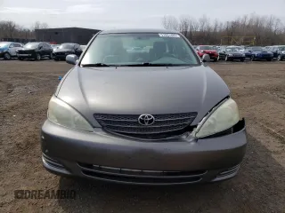 2004 Toyota Camry LE with VIN 4T1BE32K74U886385, listed as a Copart auction lot 51661485 with 175,973 mi miles and Salvage Title. Bid and sale history available at carsss.com. Image 5.