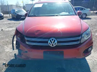 2016 Volkswagen Tiguan S with VIN WVGBV7AX4GW021564, listed as a IAAI auction lot 41995637 with 96,167 mi miles and . Bid and sale history available at DreamBid. Image 12.