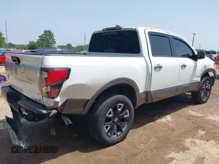 2024 Nissan Titan Pro-4X with VIN 1N6AA1ED7RN101486, listed as a IAAI auction lot 42243136 with 39,223 mi miles and . Bid and sale history available at DreamBid. Image 4.