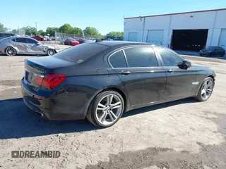 2014 BMW 7 Series ALPINA B7 with VIN WBAYE8C54ED135280, listed as a IAAI auction lot 41808186 with 76,786 mi miles. Bid and sale history available at carsss.com. Image 4.