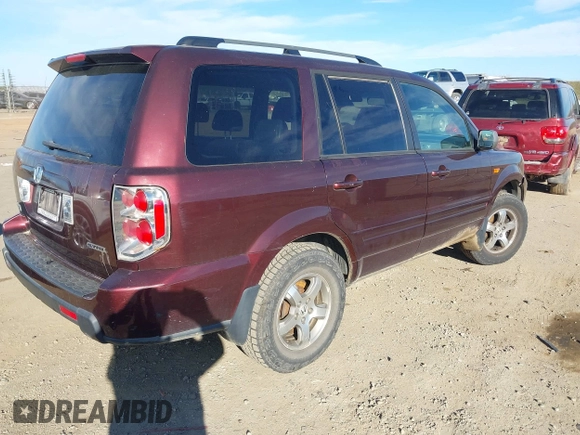2007 Honda Pilot EX-L with VIN 2HKYF18677H524713, listed as a IAAI auction lot 41345312 with 169,957 mi miles and . Bid and sale history available at DreamBid. Image 4.