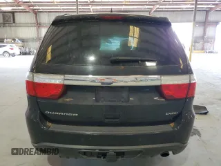 2013 Dodge Durango Crew with VIN 1C4RDHDG5DC617402, listed as a Copart auction lot 58056795 with 180,990 mi miles and Salvage title. Bid and sale history available at DreamBid. Image 6.