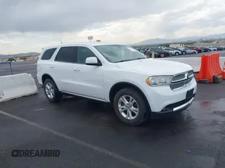 2013 Dodge Durango SXT with VIN 1C4RDJAG7DC659050, listed as a IAAI auction lot 42637236 with 162,458 mi miles and . Bid and sale history available at DreamBid. Image 1.