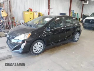 2016 Toyota Prius c One with VIN JTDKDTB3XG1124674, listed as a IAAI auction lot 41976438 with 72,028 mi miles. Bid and sale history available at carsss.com. Image 17.