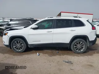 2019 Jeep Cherokee Latitude Plus with VIN 1C4PJLLB0KD307741, listed as a IAAI auction lot 41750370 with 76,036 mi miles. Bid and sale history available at carsss.com. Image 14.
