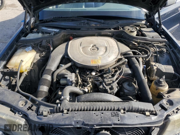 1990 Mercedes-Benz 560 with VIN WDBCA39EXLA503543, listed as a Copart auction lot 65978444 with 195,635 mi miles and Clean Title. Bid and sale history available at DreamBid. Image 11.
