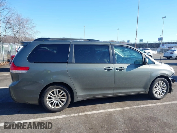 2011 Toyota Sienna XLE AAS with VIN 5TDYK3DC4BS072693, listed as a IAAI auction lot 41579262 with 146,201 mi miles. Bid and sale history available at carsss.com. Image 13.