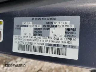 2009 Mazda 5 Sport z VIN JM1CR29L990341258, wystawiony jako Copart lot #45998485 z przebiegiem Nie podano mil oraz Szkoda całkowita • Salvage title. Historia ofert i sprzedaży dostępna na DreamBid. Obrazek 13.