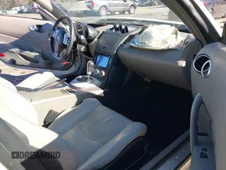2006 Nissan 350Z Touring with VIN JN1AZ36AX6M450609, listed as a IAAI auction lot 41227538 with 111,622 mi miles. Bid and sale history available at carsss.com. Image 5.