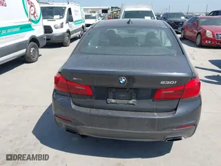2019 BMW 5 Series 530i xDrive with VIN WBAJA7C50KG910479, listed as a IAAI auction lot 41802413 with 84,932 mi miles. Bid and sale history available at carsss.com. Image 16.