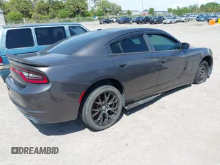 2015 Dodge Charger SE z VIN 2C3CDXBGXFH751491, wystawiony jako IAAI lot #41907243 z przebiegiem 112 545 mil mil oraz . Historia ofert i sprzedaży dostępna na DreamBid. Obrazek 4.