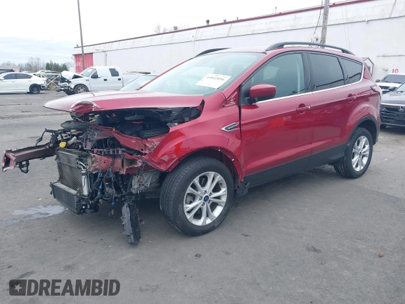 2018 Ford Escape SE z VIN 1FMCU9GD8JUB14803, wystawiony jako IAAI lot #41842056 z przebiegiem 50 712 mil mil oraz . Historia ofert i sprzedaży dostępna na DreamBid. Obrazek 2.