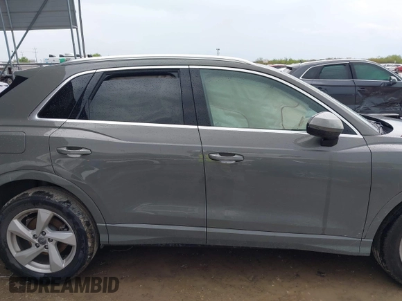 2020 Audi Q3 Premium z VIN WA1AECF30L1052472, wystawiony jako IAAI lot #41886809 z przebiegiem 101 600 mil mil oraz . Historia ofert i sprzedaży dostępna na DreamBid. Obrazek 13.