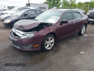 2012 Ford Fusion SE z VIN 3FAHP0HA4CR429812, wystawiony jako IAAI lot #42217492 z przebiegiem 207 215 mil mil oraz . Historia ofert i sprzedaży dostępna na DreamBid. Obrazek 2.