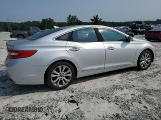 2013 Hyundai Azera z VIN KMHFG4JG9DA252768, wystawiony jako Copart lot #59143035 z przebiegiem 118 260 mil mil oraz Czysty tytuł • Clean title. Historia ofert i sprzedaży dostępna na DreamBid. Obrazek 3.
