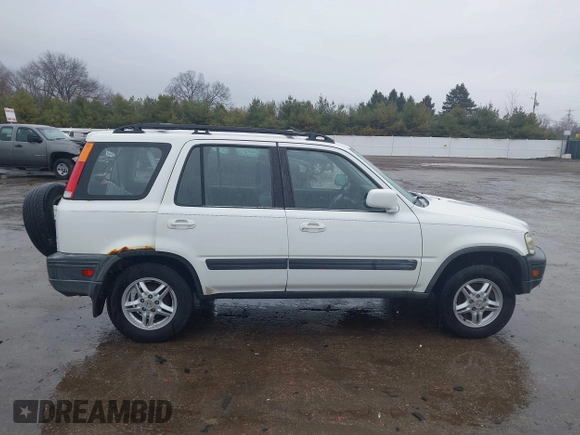 2001 Honda CR-V EX with VIN JHLRD18611C035126, listed as a IAAI auction lot 41982045 with 265,360 mi miles and . Bid and sale history available at DreamBid. Image 13.