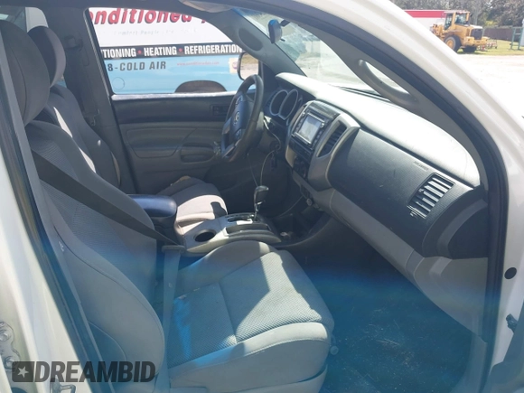 2014 Toyota Tacoma PreRunner with VIN 3TMJU4GN2EM169071, listed as a IAAI auction lot 41543601 with 304,594 mi miles. Bid and sale history available at carsss.com. Image 5.