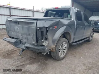 2018 Ford F-150 XL with VIN 1FTEW1EP2JFB56443, listed as a IAAI auction lot 41064561 with 105,215 mi miles. Bid and sale history available at carsss.com. Image 4.