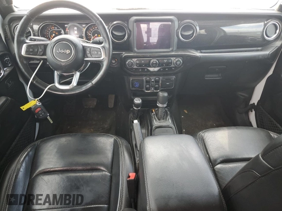2020 Jeep Gladiator Overland z VIN 1C6HJTFG6LL135872, wystawiony jako Copart lot #59249895 z przebiegiem 113 519 mil mil oraz Czysty tytuł • Clean title. Historia ofert i sprzedaży dostępna na DreamBid. Obrazek 8.