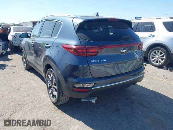 2021 Kia Sportage EX with VIN KNDPN3AC1M7889706, listed as a IAAI auction lot 41948559 with 52,329 mi miles and . Bid and sale history available at DreamBid. Image 3.
