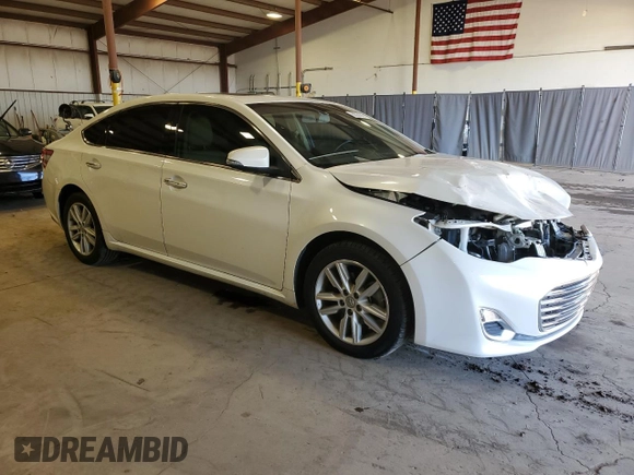 2015 Toyota Avalon Limited with VIN 4T1BK1EB9FU186136, listed as a Copart auction lot 50009945 with 106,206 mi miles and Salvage Title. Bid and sale history available at DreamBid. Image 4.