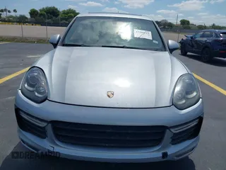 2016 Porsche Cayenne GTS z VIN WP1AD2A27GLA76018, wystawiony jako IAAI lot #42209515 z przebiegiem 49 432 mil mil oraz . Historia ofert i sprzedaży dostępna na DreamBid. Obrazek 12.