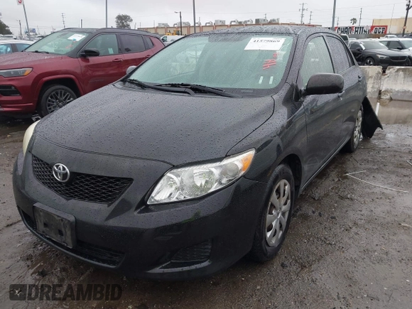 2009 Toyota Corolla with VIN JTDBL40E39J001203, listed as a IAAI auction lot 41579869 with 127,170 mi miles. Bid and sale history available at carsss.com. Image 2.
