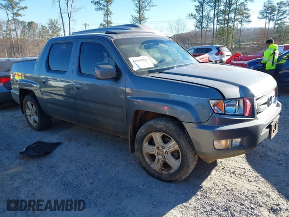 2010 Honda Ridgeline RTL with VIN 5FPYK1F52AB004678, listed as a IAAI auction lot 41661968 with 169,021 mi miles. Bid and sale history available at carsss.com. Image 1.