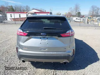 2020 Ford Edge SEL z VIN 2FMPK4J93LBB01318, wystawiony jako IAAI lot #42038334 z przebiegiem 73 435 mil mil oraz . Historia ofert i sprzedaży dostępna na DreamBid. Obrazek 16.