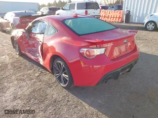 2016 Subaru BRZ Limited with VIN JF1ZCAC10G9604135, listed as a IAAI auction lot 41869556 with 74,891 mi miles. Bid and sale history available at carsss.com. Image 3.