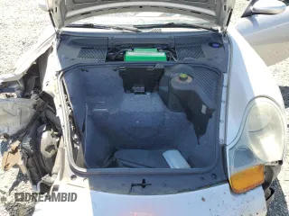 1998 Porsche Boxster z VIN WP0CA2986WU620657, wystawiony jako Copart lot #55595275 z przebiegiem 78 711 mil mil oraz Szkoda całkowita • Salvage title. Historia ofert i sprzedaży dostępna na DreamBid. Obrazek 11.