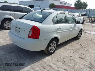 2011 Hyundai Accent GLS with VIN KMHCN4AC0BU613032, listed as a IAAI auction lot 42089042 with 132,518 mi miles. Bid and sale history available at carsss.com. Image 4.