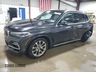 2020 BMW X5 xDrive40i z VIN 5UXCR6C09L9C51165, wystawiony jako Copart lot #58212555 z przebiegiem Nie podano mil oraz Szkoda całkowita • Salvage title. Historia ofert i sprzedaży dostępna na DreamBid. Obrazek 1.