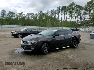 2016 Nissan Maxima SV with VIN 1N4AA6APXGC389289, listed as a Copart auction lot 51057215 with 140,532 mi miles and Salvage Title. Bid and sale history available at DreamBid. Image 13.
