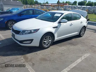 2013 Kia Optima LX z VIN KNAGM4A7XD5374109, wystawiony jako IAAI lot #42209534 z przebiegiem 184 578 mil mil oraz . Historia ofert i sprzedaży dostępna na DreamBid. Obrazek 17.