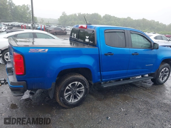 2022 Chevrolet Colorado 4WD Z71 z VIN 1GCGTDEN7N1124379, wystawiony jako IAAI lot #42372796 z przebiegiem 60 943 mil mil oraz . Historia ofert i sprzedaży dostępna na DreamBid. Obrazek 14.