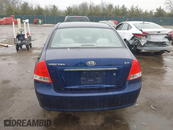 2009 Kia Spectra LX z VIN KNAFE221X95619246, wystawiony jako IAAI lot #41739339 z przebiegiem Nie podano mil oraz . Historia ofert i sprzedaży dostępna na DreamBid. Obrazek 16.