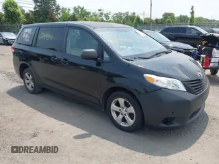2014 Toyota Sienna L z VIN 5TDZK3DCXES450220, wystawiony jako IAAI lot #42439341 z przebiegiem 220 543 mil mil oraz . Historia ofert i sprzedaży dostępna na DreamBid. Obrazek 1.