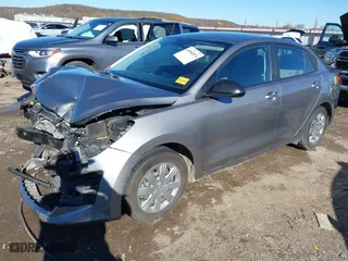 2021 Kia Rio S with VIN 3KPA24AD9ME392013, listed as a IAAI auction lot 40902874 with 82265 miles. Bid and sale history available at carsss.com. Image 18.