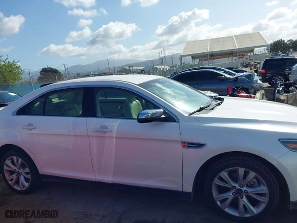 2015 Ford Taurus Limited with VIN 1FAHP2F80FG144421, listed as a IAAI auction lot 41947787 with 143,496 mi miles. Bid and sale history available at carsss.com. Image 13.