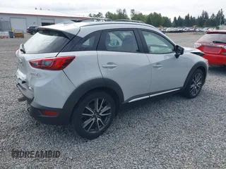 2017 Mazda CX-3 Grand Touring z VIN JM1DKFD70H0159621, wystawiony jako IAAI lot #42331482 z przebiegiem 55 166 mil mil oraz . Historia ofert i sprzedaży dostępna na DreamBid. Obrazek 4.