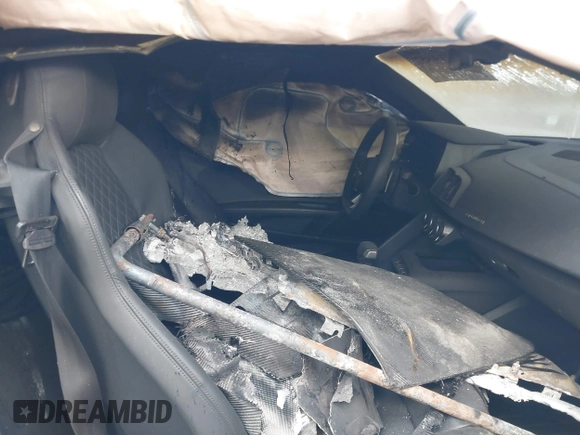 2021 Audi R8 z VIN WUAKBAFX5M7900468, wystawiony jako IAAI lot #41214857 z przebiegiem Nie podano mil oraz . Historia ofert i sprzedaży dostępna na DreamBid. Obrazek 5.