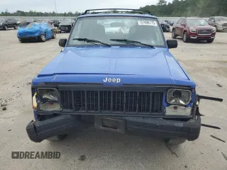 1996 Jeep Cherokee Sport z VIN 1J4FT68S8TL128381, wystawiony jako Copart lot #57496175 z przebiegiem 221 330 mil mil oraz Szkoda całkowita • Salvage title. Historia ofert i sprzedaży dostępna na DreamBid. Obrazek 5.