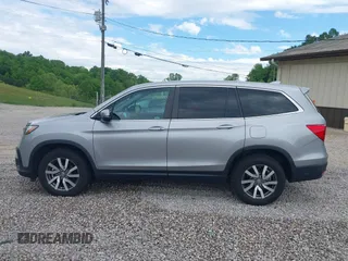2021 Honda Pilot EX-L with VIN 5FNYF6H50MB063465, listed as a IAAI auction lot 42160636 with 28,595 mi miles and . Bid and sale history available at DreamBid. Image 14.