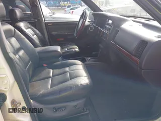 1998 Jeep Grand Cherokee Limited z VIN 1J4GZ78Y9WC342250, wystawiony jako IAAI lot #42047991 z przebiegiem 271 579 mil mil oraz . Historia ofert i sprzedaży dostępna na DreamBid. Obrazek 5.