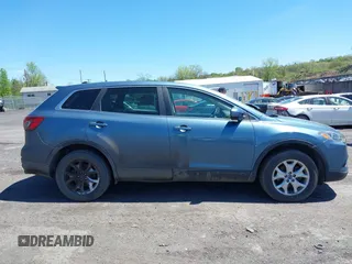2014 Mazda CX-9 Touring with VIN JM3TB3CV1E0447130, listed as a IAAI auction lot 40815387 with 148,985 mi miles. Bid and sale history available at carsss.com. Image 13.