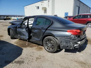 2020 BMW 5 Series 530e with VIN WBAJA9C02LCE53489, listed as a Copart auction lot 56739195 with Not provided miles and Salvage title. Bid and sale history available at DreamBid. Image 2.