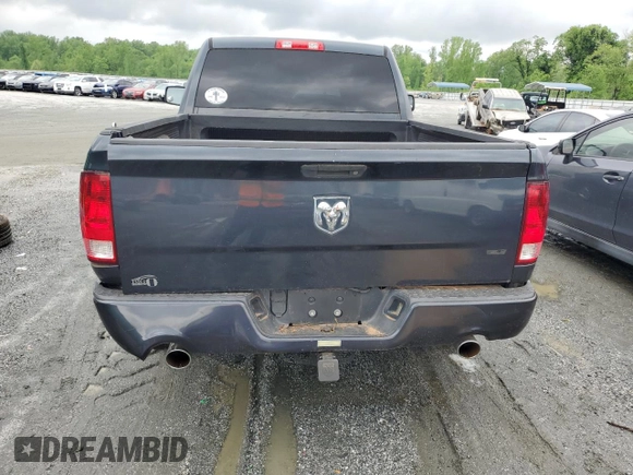 2014 Ram 1500 Express with VIN 3C6JR6AT1EG182095, listed as a Copart auction lot 53888745 with 105,798 mi miles and Salvage title. Bid and sale history available at DreamBid. Image 6.